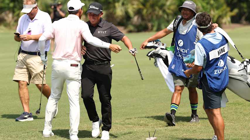 Jeffrey Kang (L) of the United States reacts with partner Doug Ghim of the United States after holing out for an eagle on the tenth hole during the final round of the Zurich Classic of New Orleans 2026 at TPC Louisiana on April 26, 2026 in Avondale, Louisiana. (Stacy Revere/Getty Images)