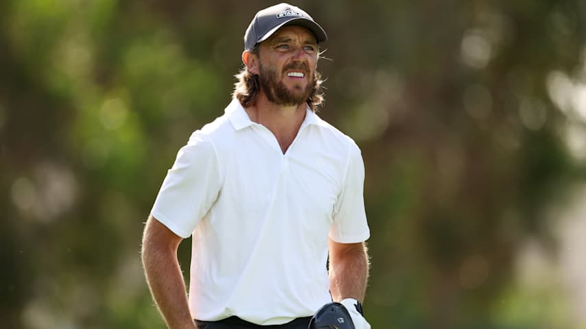 Tommy Fleetwood of England reacts to his tee shot on the 16th hole during day three of the Hero Dubai Desert Classic 2026 at Emirates Golf Club on January 24, 2026 in Dubai, United Arab Emirates. (Andrew Redington/Getty Images)