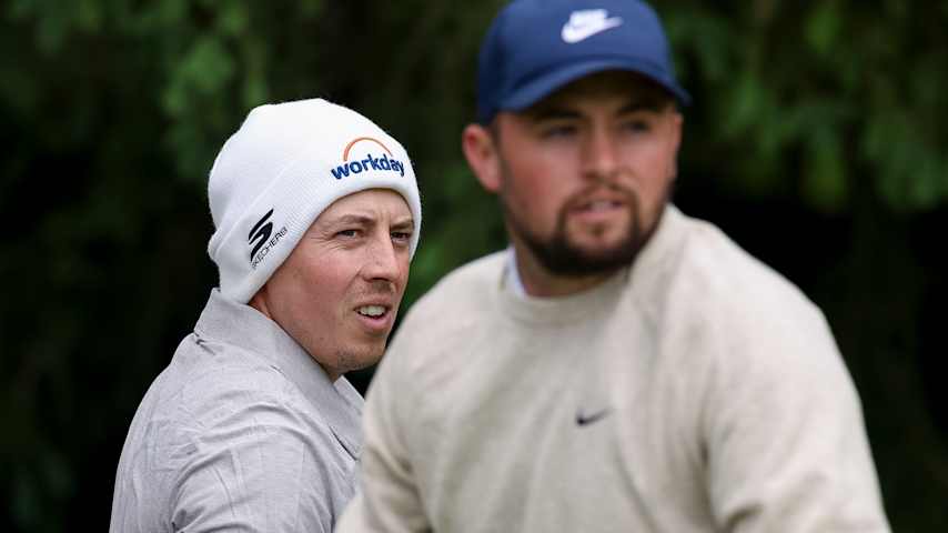 Alex Fitzpatrick (R) of England watches his shot from the fourth tee ahead of Matthew Fitzpatrick of England during a practice round prior to the PGA Championship at Aronimink Golf Club on May 11, 2026 in Newtown, Pennsylvania. (Richard Heathcote/Getty Images)