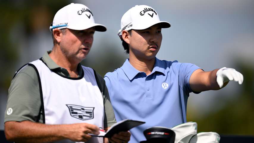 Min Woo Lee of Australia prepares to play a shot on the third hole alongside caddie Shane Joel prior to the Cadillac Championship 2026 at Trump National Doral Miami on April 29, 2026 in Doral, Florida. (Orlando Ramirez/Getty Images)