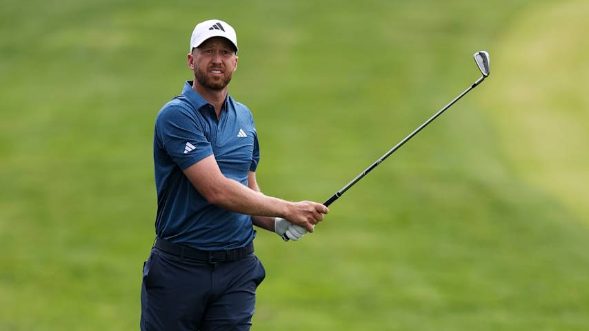 Daniel Berger of the United States plays a shot on the ninth hole during the first round of the PGA Championship at Aronimink Golf Club on May 14, 2026 in Newtown, Pennsylvania. (Richard Heathcote/Getty Images)