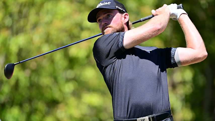 Danny Walker of the United States plays his shot from the seventh tee during the final round of the Valspar Championship 2026 at Copperhead Course at Innisbrook Resort and Golf Club on March 22, 2026 in Palm Harbor, Florida. (Julio Aguilar/Getty Images)
