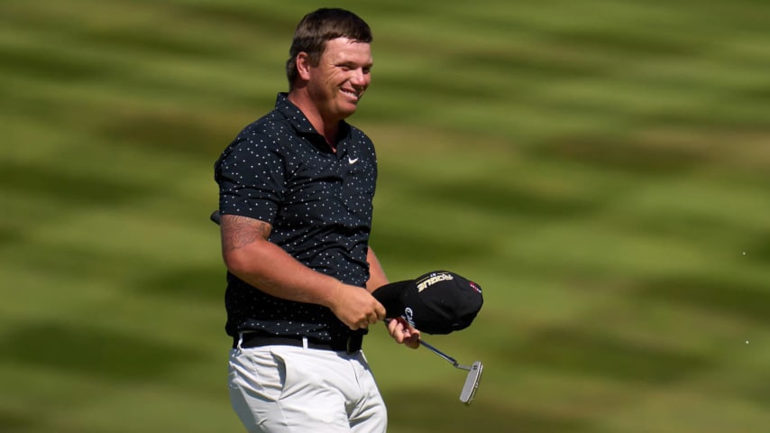 NEWPORT, WALES - AUGUST 07: Callum Shinkwin of England celebrates on the 18th hole after successfully putting the winning shot to defeat Connor Syme of Scotland and win the Cazoo Open during day four of the Cazoo Open at Celtic Manor Resort on August 07, 2022 in Newport, Wales. (Photo by Angel Martinez/Getty Images)