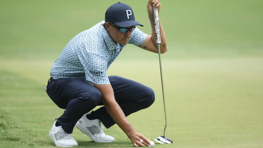 FORT WORTH, TEXAS - MAY 24: Rickie Fowler of the United States lines up a putt on the fifth green during the second round of the Charles Schwab Challenge at Colonial Country Club on May 24, 2024 in Fort Worth, Texas. (Photo by Tim Heitman/Getty Images)