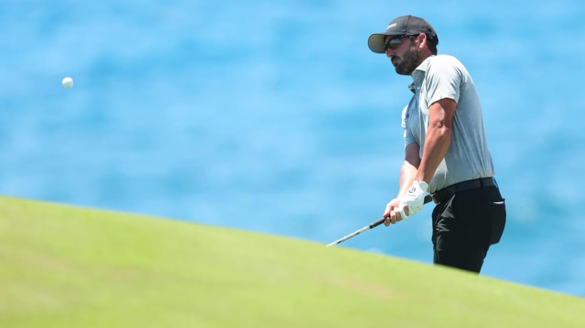 PUNTA CANA, DOMINICAN REPUBLIC - APRIL 19: Andrew Landry of the United States chips to a green during the second round of the Corales Puntacana Championship at Puntacana Resort & Club, Corales Golf Course on April 19, 2024 in Punta Cana, Dominican Republic. (Photo by Bryan M. Bennett/Getty Images)