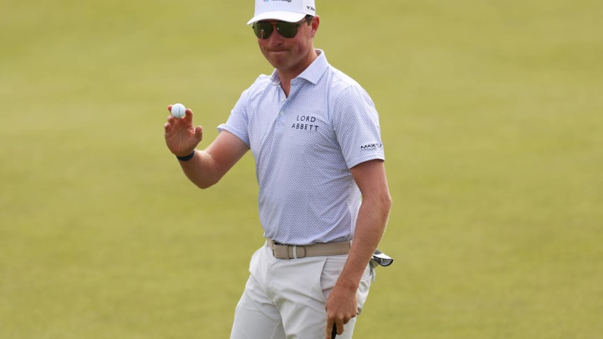 NORTH BERWICK, SCOTLAND - JULY 12: Ben Griffin of the United States reacts following par putt on the sixth green during day two of the Genesis Scottish Open at The Renaissance Club on July 12, 2024 in North Berwick, Scotland. (Photo by Harry How/Getty Images)