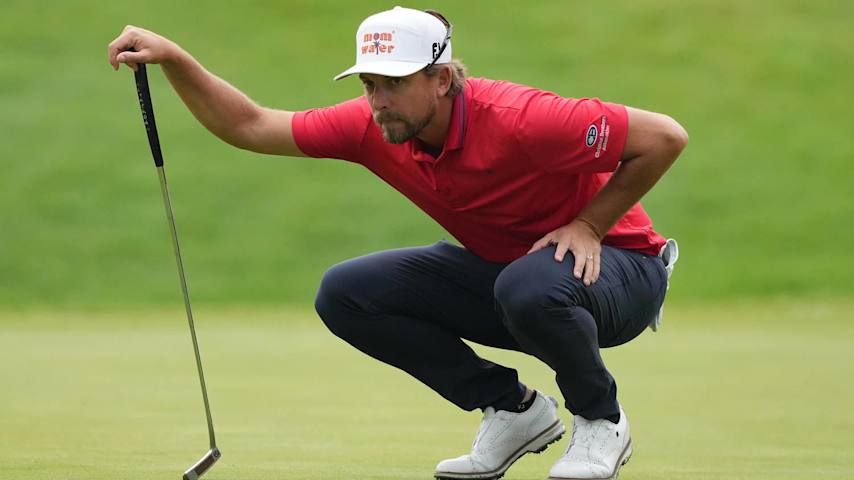 SILVIS, ILLINOIS - JULY 04: Roger Sloan prepares to putt on the first hole green during the first round of the John Deere Classic at TPC Deere Run on July 04, 2024 in Silvis, Illinois. (Photo by Dylan Buell/Getty Images)
