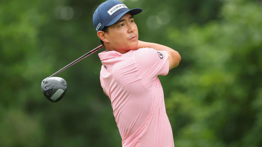 SILVIS, ILLINOIS - JULY 04: Justin Suh of the United States hits his tee shot on the 15th hole during the first round of the John Deere Classic at TPC Deere Run on July 04, 2024 in Silvis, Illinois. (Photo by Stacy Revere/Getty Images)