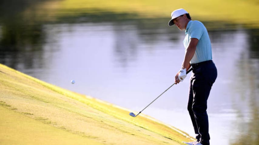 LAS VEGAS, NEVADA - OCTOBER 14: Cameron Champ of the United States chips on the 17th hole during the third round of the Shriners Children's Open at TPC Summerlin on October 14, 2023 in Las Vegas, Nevada. (Photo by Orlando Ramirez/Getty Images)