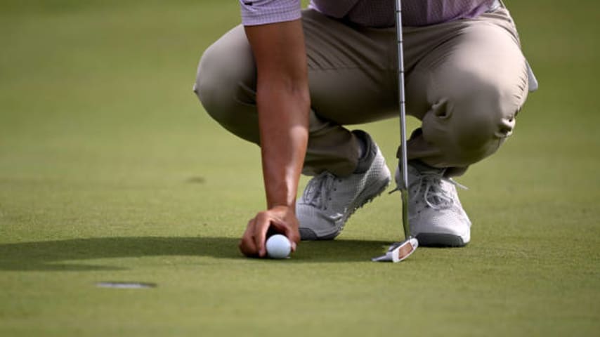 LAS VEGAS, NEVADA - OCTOBER 13: Justin Suh of the United States lines up a putt on the tenth green during the second round of the Shriners Children's Open at TPC Summerlin on October 13, 2023 in Las Vegas, Nevada. (Photo by Orlando Ramirez/Getty Images)