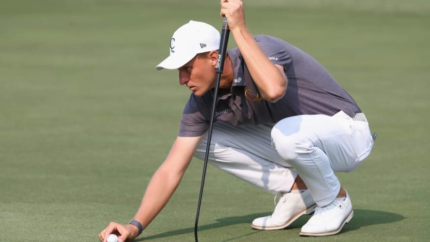 HONG KONG, CHINA - MARCH 08: Adrian Meronk of Cleeks GC lines up a putt on the 10th green during day one of the LIV Golf Invitational - Hong Kong at The Hong Kong Golf Club on March 08, 2024 in Hong Kong, China. (Photo by Lintao Zhang/Getty Images)