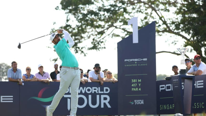 SINGAPORE, SINGAPORE - MARCH 24: Matthieu Pavon of France tees off on the first hole during Day Four of the Porsche Singapore Classic at Laguna National Golf Resort Club on March 24, 2024 in Singapore. (Photo by Yong Teck Lim/Getty Images)