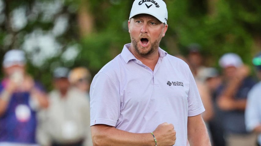 RIO GRANDE, PUERTO RICO - MARCH 10: Brice Garnett of the United States celebrates making his putt for birdie on the 18th green, the fourth-playoff hole, to win against Erik Barnes (not pictured) of the United States, during the final round of the Puerto Rico Open at Grand Reserve Golf Club on March 10, 2024 in Rio Grande, Puerto Rico. (Photo by Andy Lyons/Getty Images)