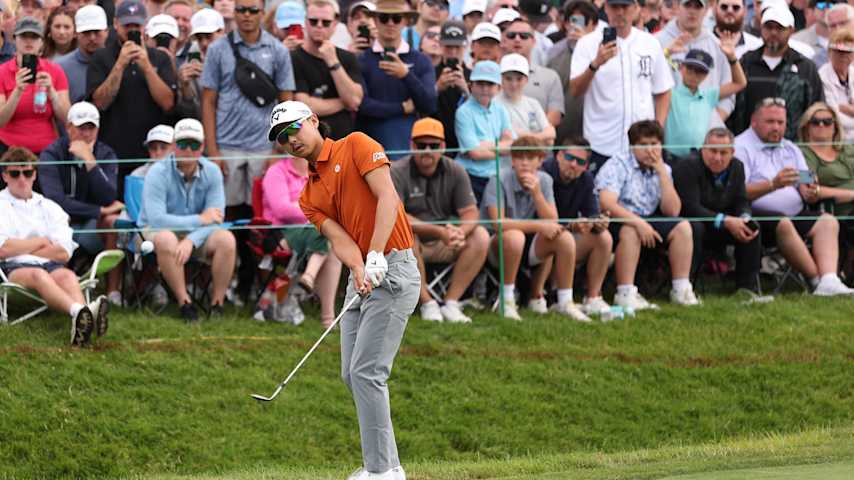 DETROIT, MICHIGAN - JUNE 30: Min Woo Lee of Australia chips to the 18th green during the final round of the Rocket Mortgage Classic at Detroit Golf Club on June 30, 2024 in Detroit, Michigan. (Photo by Gregory Shamus/Getty Images)