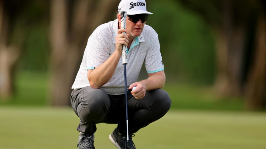 HONOLULU, HAWAII - JANUARY 11: Ryan Brehm of the United States lines up a putt on the fourth green during the first round of the Sony Open in Hawaii at Waialae Country Club on January 11, 2024 in Honolulu, Hawaii. (Photo by Michael Reaves/Getty Images)