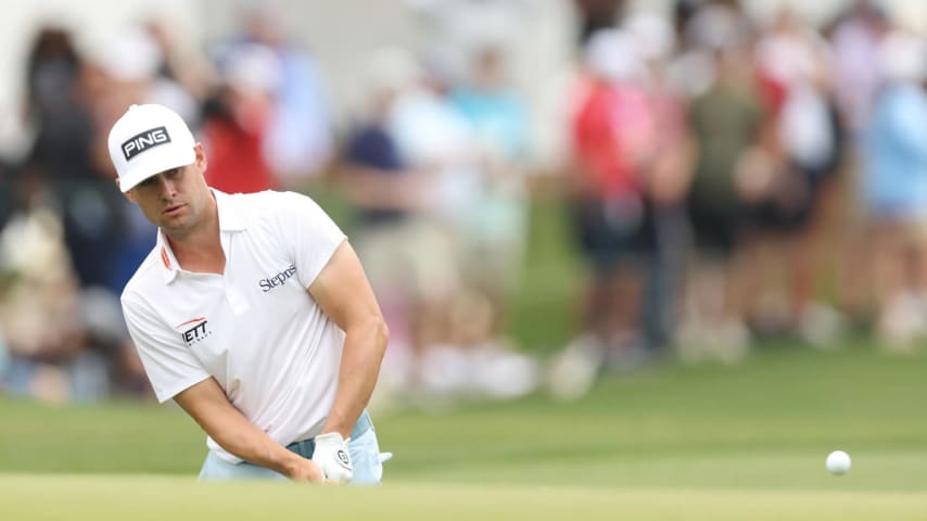 HOUSTON, TEXAS - MARCH 31: Taylor Moore of the United States putts on the 18th green during the final round of the Texas Children's Houston Open at Memorial Park Golf Course on March 31, 2024 in Houston, Texas. (Photo by Joe Scarnici/Getty Images)