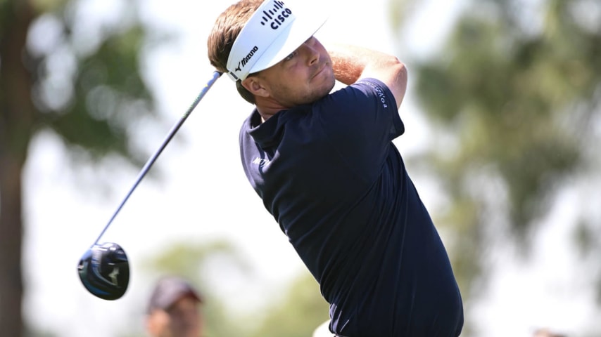 HOUSTON, TEXAS - MARCH 28: Keith Mitchell of the United States hits a tee shot on the 12th hole during the first round of the Texas Children's Houston Open at Memorial Park Golf Course on March 28, 2024 in Houston, Texas. (Photo by Logan Riely/Getty Images)