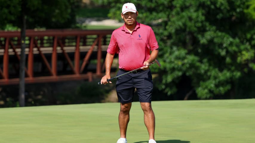 MCKINNEY, TEXAS - APRIL 30: Chan Kim looks over a putt on the fourth hole prior to THE CJ CUP Byron Nelson at TPC Craig Ranch on April 30, 2024 in McKinney, Texas. (Photo by Mike Mulholland/Getty Images for The CJ Cup)