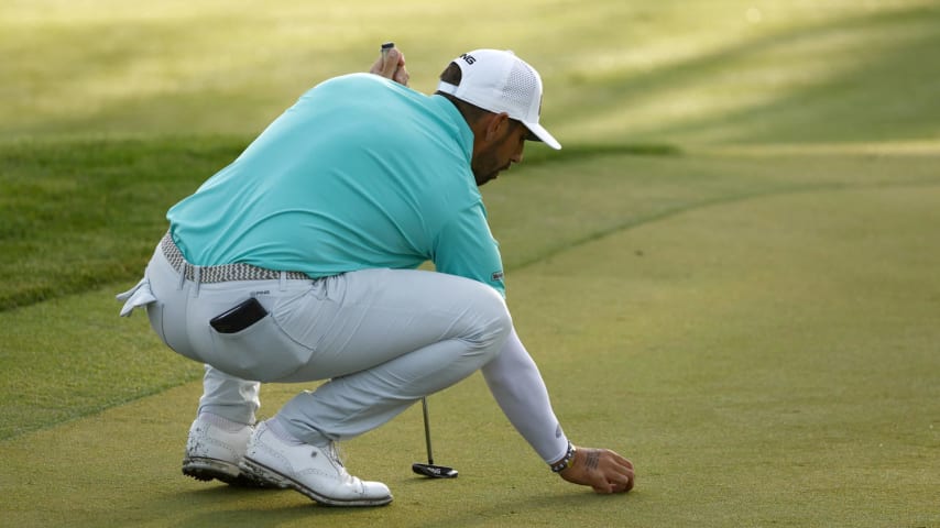 PALM BEACH GARDENS, FLORIDA - FEBRUARY 29: Matthieu Pavon of France lines up a putt on the tenth green during the first round of The Cognizant Classic in The Palm Beaches at PGA National Resort And Spa on February 29, 2024 in Palm Beach Gardens, Florida. (Photo by Douglas P. DeFelice/Getty Images)