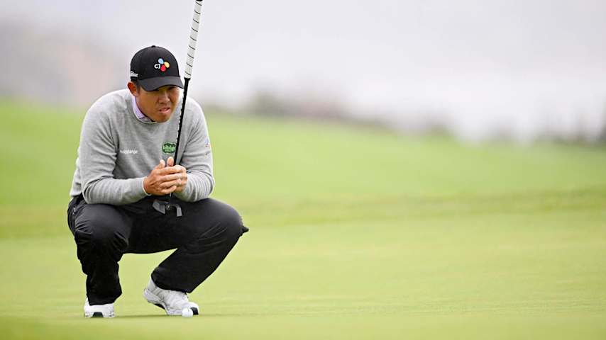 LA JOLLA, CALIFORNIA - FEBRUARY 13: Byeong Hun An of South Korea lines up a putt on the fourth green during the first round of The Genesis Invitational 2025 at Torrey Pines Golf Course on February 13, 2025 in La Jolla, California. (Photo by Orlando Ramirez/Getty Images)
