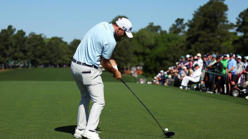 AUGUSTA, GEORGIA - APRIL 14: Russell Henley of the United States plays his shot from the first tee during the final round of the 2024 Masters Tournament at Augusta National Golf Club on April 14, 2024 in Augusta, Georgia. (Photo by Andrew Redington/Getty Images)