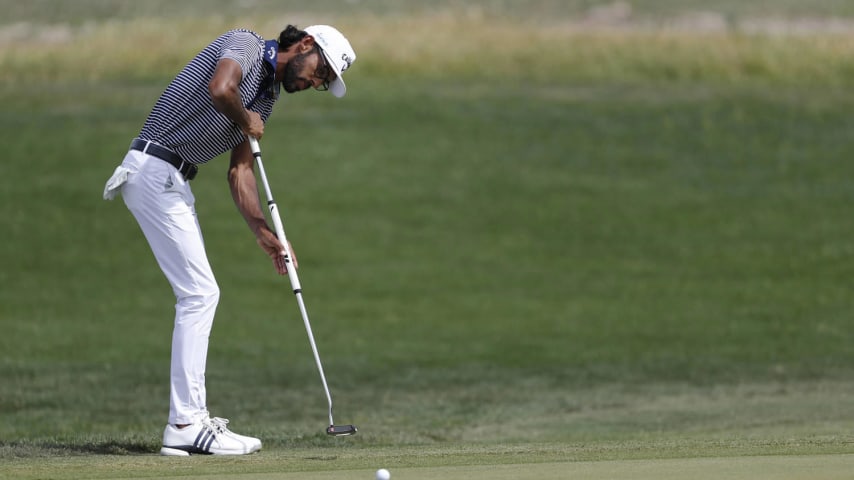 SAN ANTONIO, TEXAS - APRIL 07: Akshay Bhatia of the United States plays his putt shot on the 15th hole during the final round of the Valero Texas Open at TPC San Antonio on April 07, 2024 in San Antonio, Texas. (Photo by Raj Mehta/Getty Images)