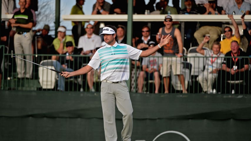 SCOTTSDALE, AZ - JANUARY 30: Bubba Watson celebrates a birdie on the 16th hole during the first round of the Waste Management Phoenix Open at TPC Scottsdale on January 30, 2014 in Scottsdale, Arizona.  (Photo by Robert Laberge/Getty Images)