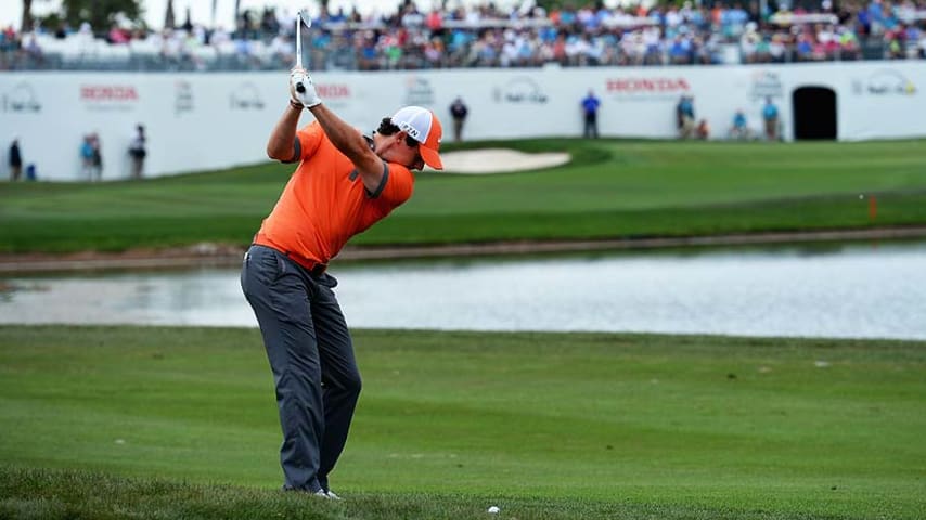 PALM BEACH GARDENS, FL - FEBRUARY 27:  Rory McIlroy of Northern Ireland plays a shot during the first round of The Honda Classic at PGA National Resort and Spa on February 27, 2014 in Palm Beach Gardens, Florida.  (Photo by Stuart Franklin/Getty Images)