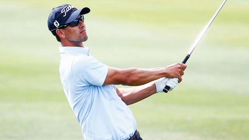 ORLANDO, FL - MARCH 21: Adam Scott of Australia hits an approach shot on the 11th hole during the second round of the Arnold Palmer Invitational presented by MasterCard at the Bay Hill Club and Lodge on March 21, 2014 in Orlando, Florida.  (Photo by Sam Greenwood/Getty Images)