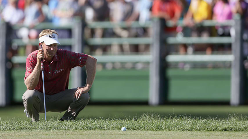 WHITE SULPHUR SPRINGS, WV - JULY 05:  Billy Hurley III lines up a putt on the 18th green during the third round of the Greenbrier Classic at the Old White TPC on July 5, 2014 in White Sulphur Springs, West Virginia.  (Photo by Todd Warshaw/Getty Images)