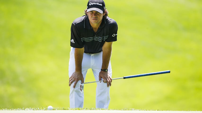 SILVIS, IL - JULY 13: Brian Harman lines up a putt on the fifth green during the final round of the John Deere Classic held at TPC Deere Run on July 13, 2014 in Silvis, Illinois. (Photo by Gregory Shamus/Getty Images)