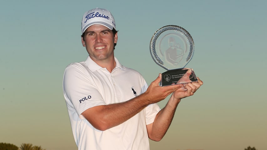 LAS VEGAS, NV - OCTOBER 19:  Ben Martin poses with the championship trophy after his victory in the Shriners Hospitals For Children Open at TPC Summerlin on October 19, 2014 in Las Vegas, Nevada.  (Photo by Darren Carroll/Getty Images)