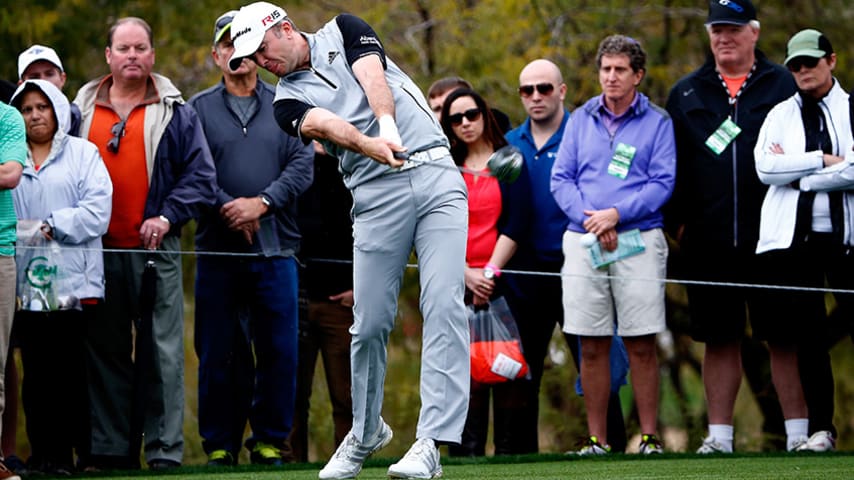 SCOTTSDALE, AZ - JANUARY 31: Martin Laird of Scotland hits a tee shot on the 9th hole during the third round of the Waste Management Phoenix Open at TPC Scottsdale on January 31, 2015 in Scottsdale, Arizona.  (Photo by Sam Greenwood/Getty Images)