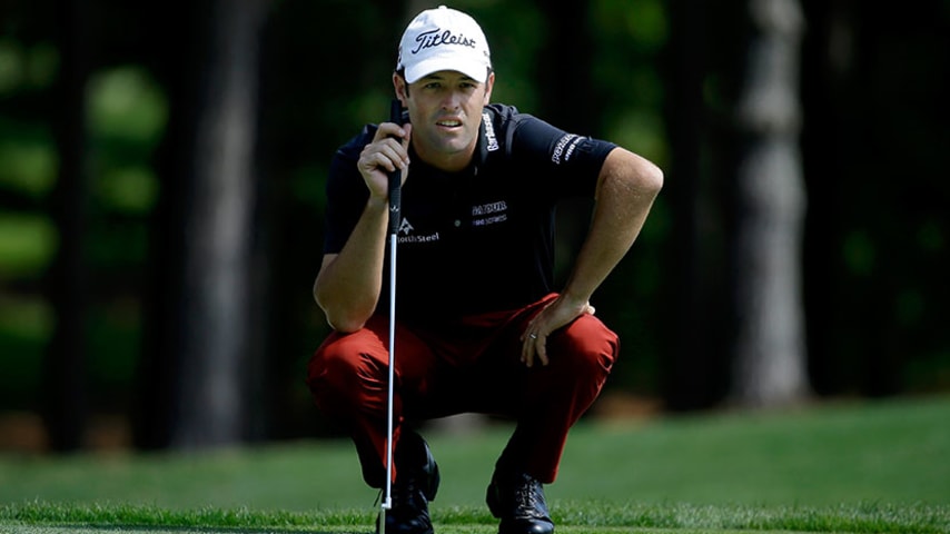 CHARLOTTE, NC - MAY 14:  Robert Streb lines up a putt on the first hole during round one at the Wells Fargo Championship at Quail Hollow Club on May 14, 2015 in Charlotte, North Carolina.  (Photo by Jeff Gross/Getty Images)