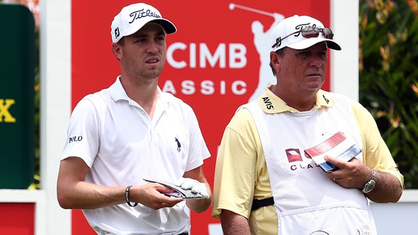 KUALA LUMPUR, MALAYSIA - OCTOBER 30: Justin Thomas of United States waits with hsi caddie on the 15th hole during round two of the CIMB Classic at Kuala Lumpur Golf & Country Club on October 30, 2015 in Kuala Lumpur, Malaysia. (Photo by Stanley Chou/Getty Images)