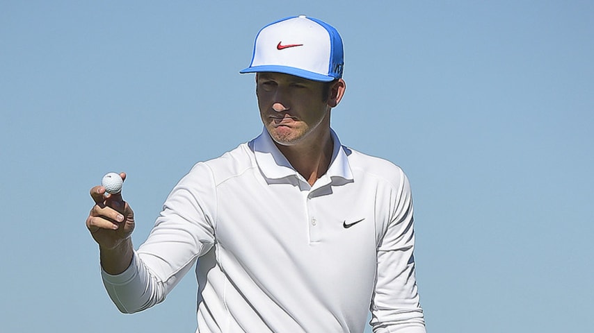 SEA ISLAND, GEORGIA - NOVEMBER 20: Kevin Chappell    acknowledges the gallery on the eighth hole on the Seaside course during the second round at The RSM Classic at Sea Island Resort Seaside Course on November 20, 2015 in Sea Island, Georgia. (Photo by Stan Badz/PGA TOUR)