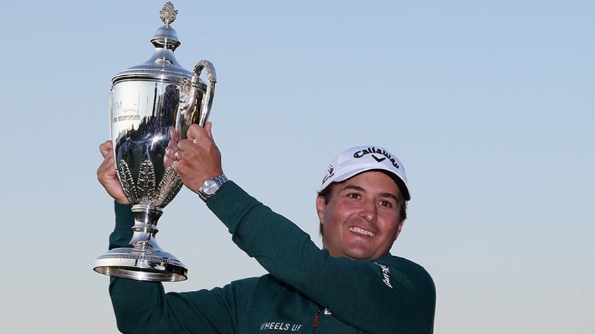 ST SIMONS ISLAND, GA - NOVEMBER 22:  Kevin Kisner celebrates with the winner's trophy on the 18th green of the Seaside Course after winning The RSM Classic on November 22, 2015 in St Simons Island, Georgia.  (Photo by Matt Sullivan/Getty Images)