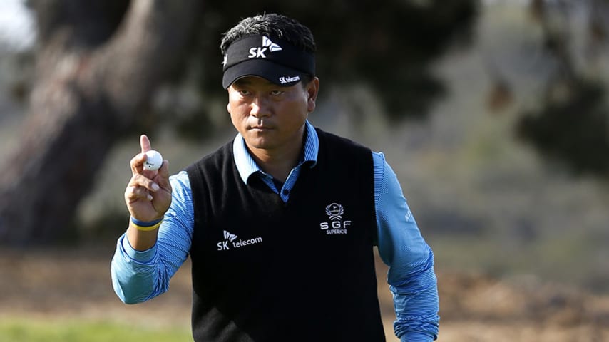 SAN DIEGO, CA - JANUARY 29:  K.J. Choi of South Korea waves to the crowd on the 8th green during Round 2 of the Farmers Insurance Open at Torrey Pines North on January 29, 2016 in San Diego, California.  (Photo by Sean M. Haffey/Getty Images)