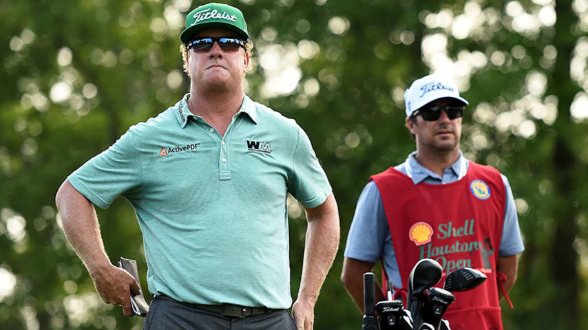 HUMBLE, TX - MARCH 31:   Charley Hoffman of the United States waits on the ninth tee with his caddie Brett Waldman during the first round of the Shell Houston Open at the Golf Club of Houston on March 31, 2016 in Humble, Texas.  (Photo by Stacy Revere/Getty Images)
