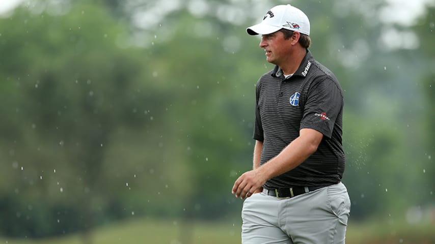 AVONDALE, LA - APRIL 28:  Brian Stuard walks off on the 18th hole after play was called due to inclement weather during the first round of the Zurich Classic of New Orleans at TPC Louisiana on April 28, 2016 in Avondale, Louisiana.  (Photo by Chris Graythen/Getty Images)