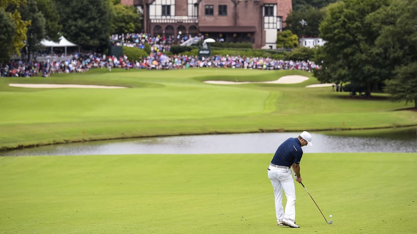 ATLANTA, GA - SEPTEMBER 27:  Jordan Spieth plays his approach shot from the ninth hole fairway during the final round of the TOUR Championship by Coca-Cola, the final event of the FedExCup Playoffs, at East Lake Golf Club on September 27, 2015 in Atlanta, Georgia. (Photo by Chris Condon/PGA TOUR)