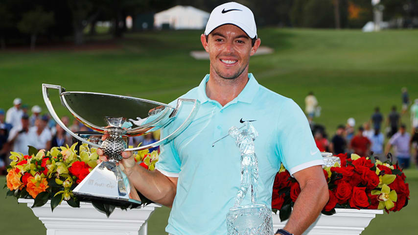ATLANTA, GA - SEPTEMBER 25:  Rory McIlroy of Northern Ireland poses with the FedExCup and TOUR Championship trophies after his victory over Ryan Moore with a birdie on the fourth extra hole during the TOUR Championship at East Lake Golf Club on September 25, 2016 in Atlanta, Georgia.  (Photo by Kevin C. Cox/Getty Images)