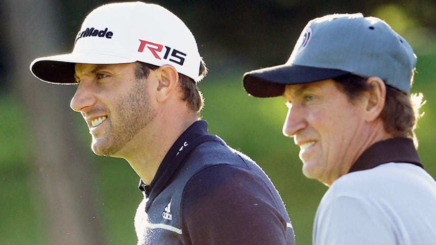 PEBBLE BEACH, CA - FEBRUARY 12:  Dustin Johnson (L) waits alongside hockey legend Wayne Gretzky during the first round of the AT&T Pebble Beach National Pro-Am at Monterey Peninsula Country Club on February 12, 2015 in Pebble Beach, California.  (Photo by Jeff Gross/Getty Images)