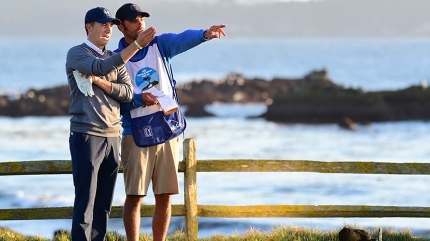 PEBBLE BEACH, CA - FEBRUARY 11:  Jordan Spieth speaks with his caddie on the 18th hole tee during Round Three of the AT&T Pebble Beach Pro-Am at Pebble Beach Golf Links  on February 11, 2017 in Pebble Beach, California.  (Photo by Harry How/Getty Images)