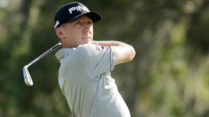 PONTE VEDRA BEACH, FL - MAY 11:  Mackenzie Hughes of Canada plays his shot from the 12th tee during the first round of the THE PLAYERS Championship at the Stadium course at TPC Sawgrass on May 11, 2017 in Ponte Vedra Beach, Florida.  (Photo by Andy Lyons/Getty Images)