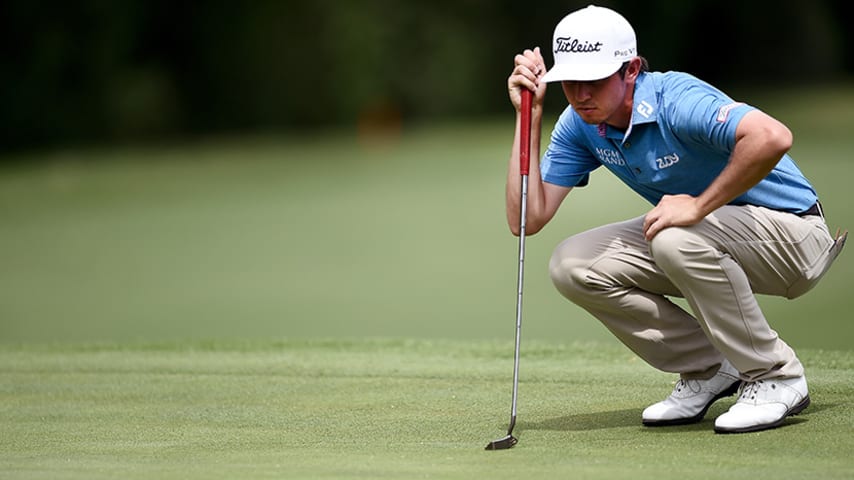 FORT WORTH, TX - MAY 25:  J.T. Poston lines up a putt on the fifth green during Round One of the DEAN & DELUCA Invitational at Colonial Country Club on May 25, 2017 in Fort Worth, Texas.  (Photo by Stacy Revere/Getty Images)