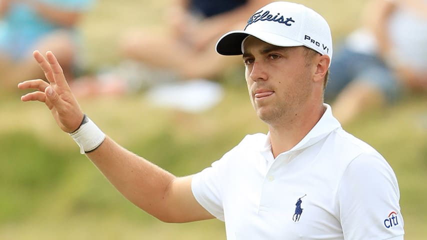 HARTFORD, WI - JUNE 17:  Justin Thomas of the United States reacts after making a birdie on the 17th green during the third round of the 2017 U.S. Open at Erin Hills on June 17, 2017 in Hartford, Wisconsin.  (Photo by Andrew Redington/Getty Images)