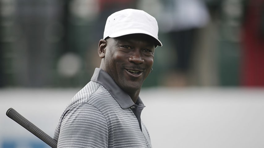 NORTH LAS VEGAS, NV - APRIL 04:  NBA legend Michael Jordan prepares to hit a tee shot during ARIA Resort & Casino's 13th Annual Michael Jordan Celebrity Invitational at Shadow Creek on April 4, 2014 in North Las Vegas, Nevada.  (Photo by Isaac Brekken/Getty Images for Michael Jordan Celebrity Invitational)