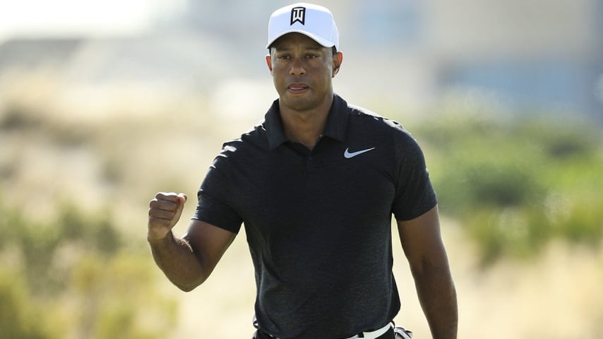 NASSAU, BAHAMAS - NOVEMBER 30:  Tiger Woods of the United States reacts to his birdie on the eighth green during the first round of the Hero World Challenge at Albany, Bahamas on November 30, 2017 in Nassau, Bahamas.  (Photo by Mike Ehrmann/Getty Images)