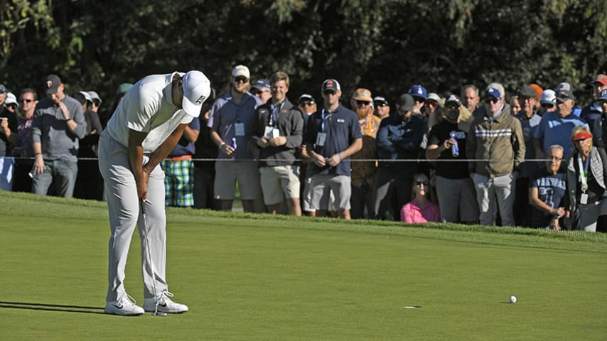 PACIFIC PALISADES, CA - FEBRUARY 16: Tiger Woods lowers his head after missing a putt on the 11th hole during the second round of the Genesis Open at Riviera Country Club on February 16, 2018 in Pacific Palisades, California. (Photo by Stan Badz/PGA TOUR)